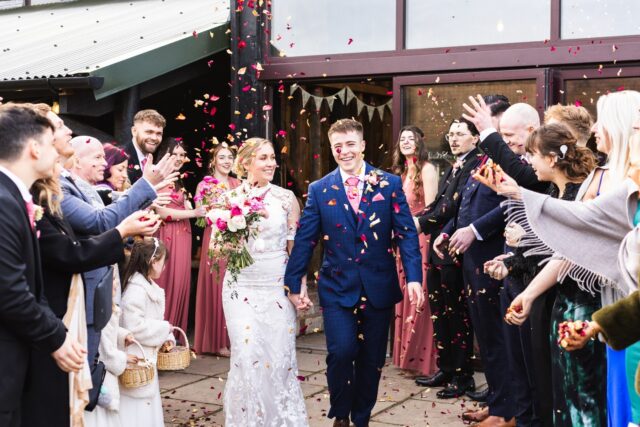 Throwing confetti at weddings symbolises good luck, happiness, and prosperity for the newly married couple. 

At Over Barn, we love seeing the creative ways our couples interpret this tradition. While we don't allow traditional paper confetti, the use of natural petals has to be our favourite. From incorporating the bride's bouquet to those first date flowers, the personal touches just make this part of the celebration that much more special. 

If petals aren't your thing, bubble wands are a fantastic way to get everyone involved in the celebration!

📸 Oli Kirk
📸 Damian Wills
📸 jbpweddings
📸 Damian Wills